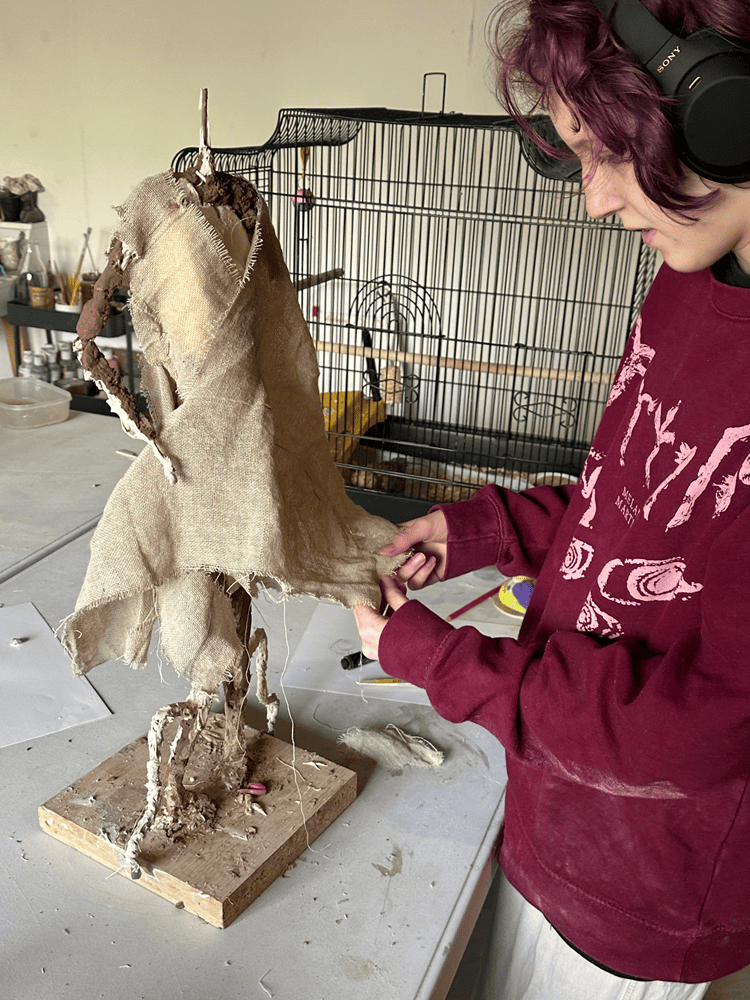 Student doing painting