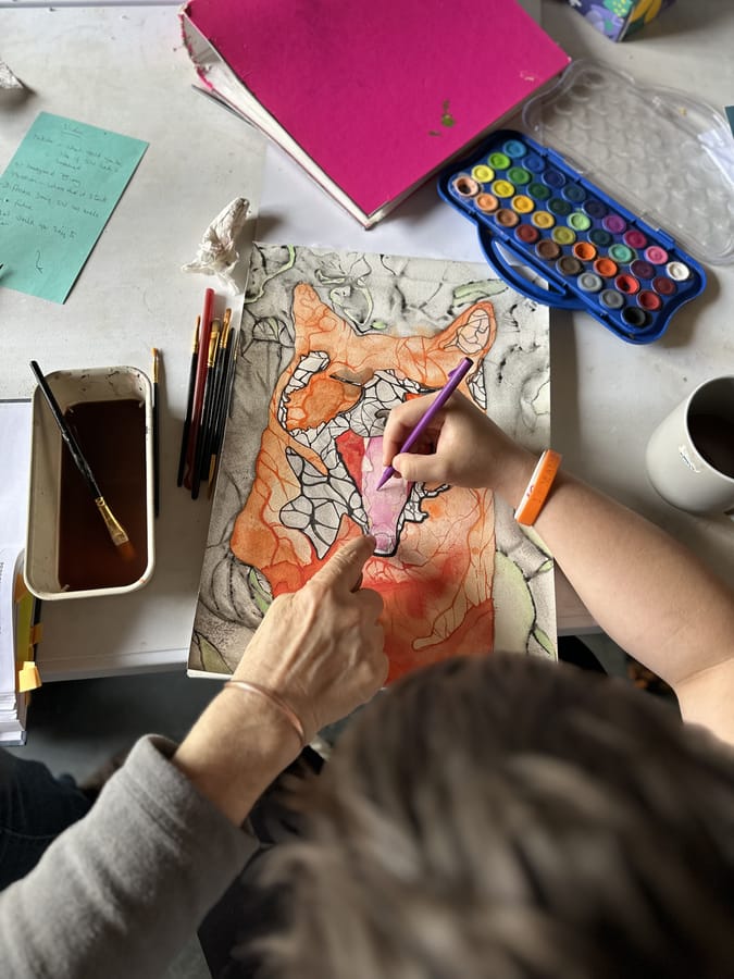 Student doing painting
